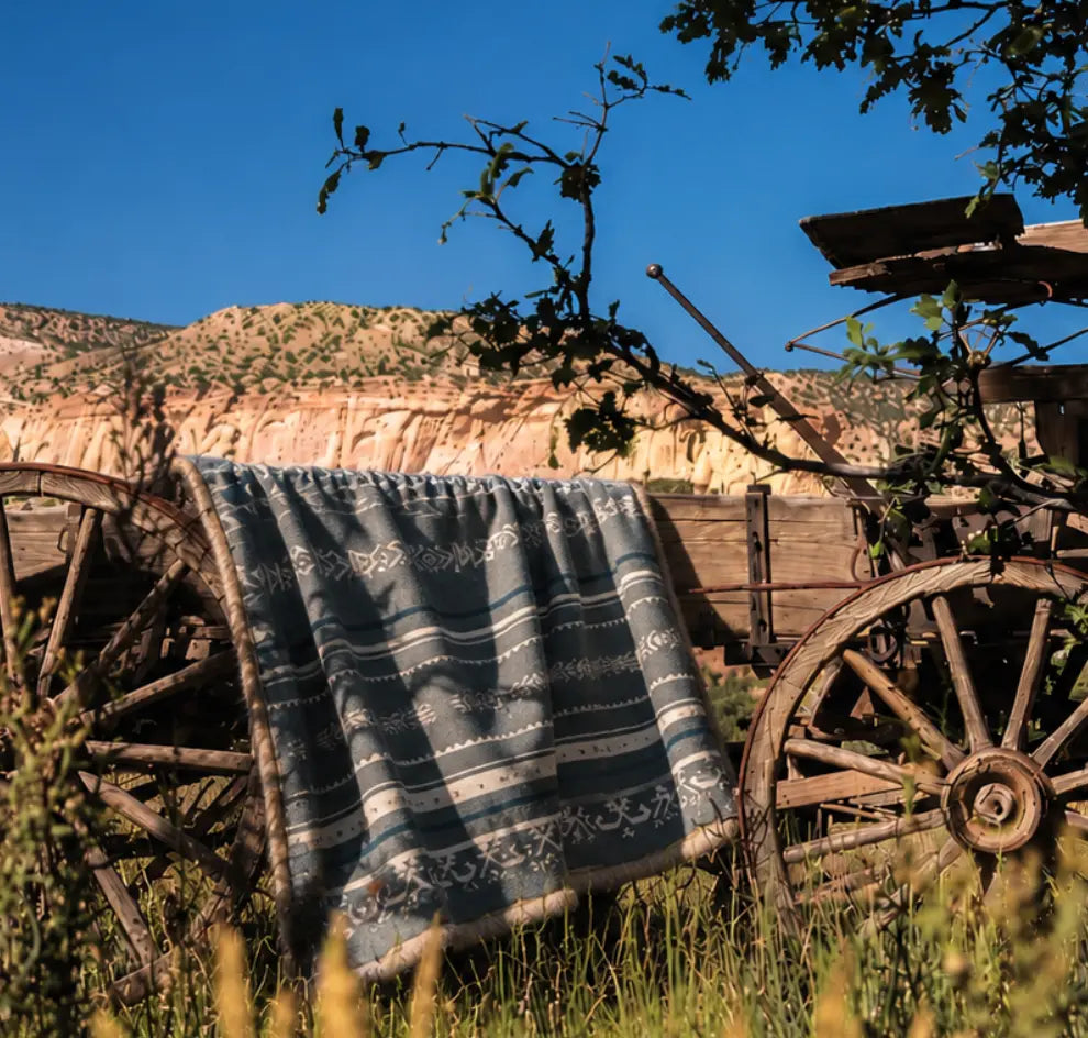 Wings in the Wind: How Reversible Art Blankets Redefine Glamping Luxury